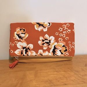 Rachel Pally clutch. Yellow floral. Never used it. Good condition.